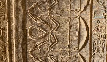 Close-up of ancient Egyptian stone carvings.
