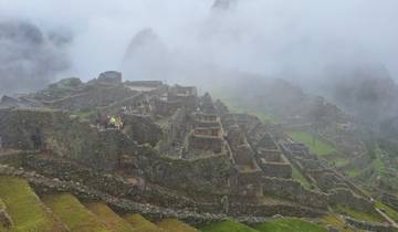 Foggy ruins atop a mountain.