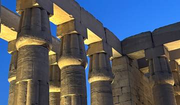 Close-up of illuminated columns from an ancient temple.