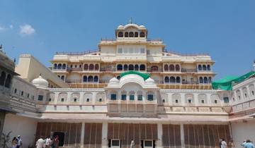 Large historic palace building with multiple stories.