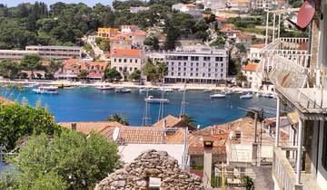 Scenic view of a coastal village with boats