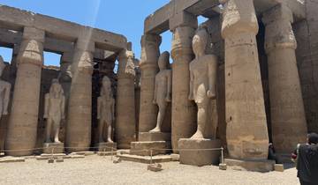 Gigantic stone statues within an ancient temple.