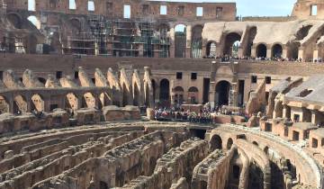 Inside view of the Colosseum with visitors