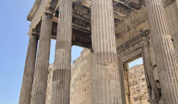 Close-up of ancient stone columns of a Greek temple.