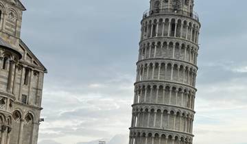 The Leaning Tower of Pisa with adjacent cathedral.