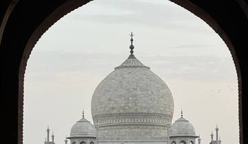 Close-up of the Taj Mahal framed by an archway.