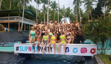 Large group of people posing at a waterpark event.