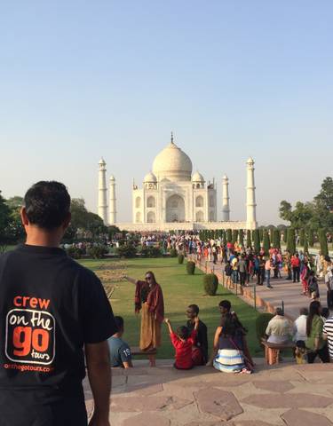 Tourists viewing the Taj Mahal.