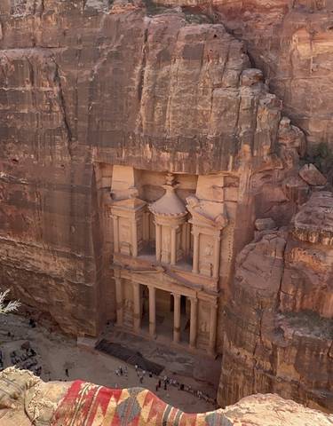 Petra's Treasury carved into rock.