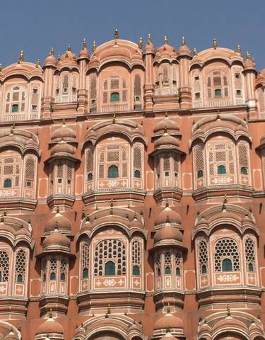 Hawa Mahal with intricate red sandstone facade.