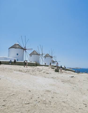 Famous windmills with a clear blue sky in the background.