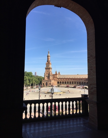Plaza de España with its distinctive architecture in the background.