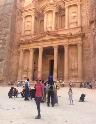 Tourists visiting the iconic Petra Treasury.