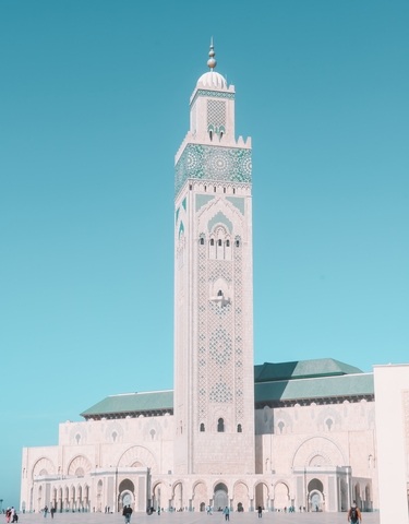 Hassan II Mosque in Casablanca with clear blue sky.