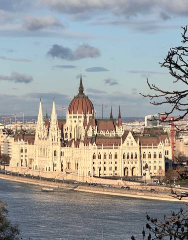 The Hungarian Parliament Building in Budapest by the river.