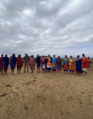 Group of people in colorful traditional attire.