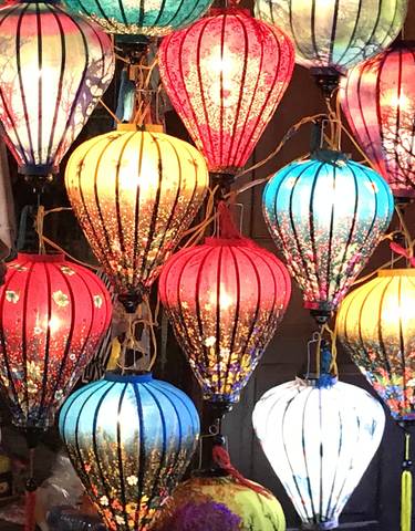 Decorative colorful lanterns illuminating a night market.