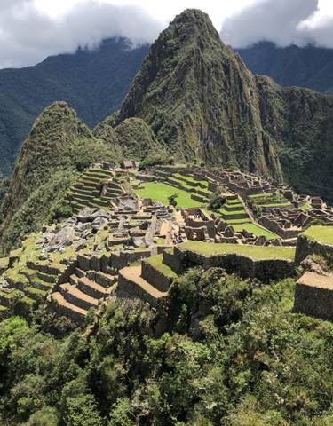 The ancient Inca city of Machu Picchu with terraced hills.