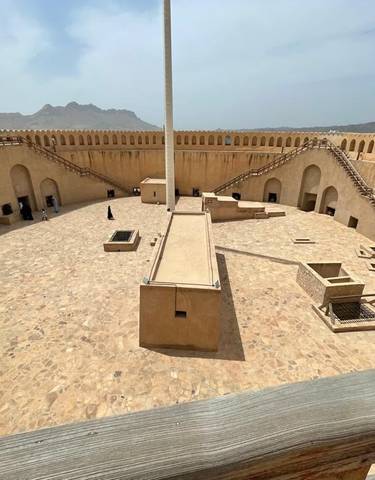 Interior courtyard of a fortress with staircases.