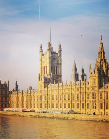 Iconic Gothic-style building with multiple towers.