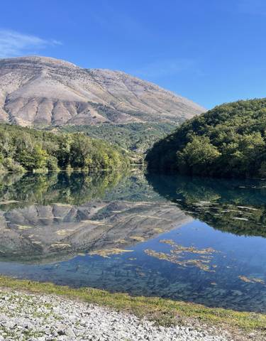 Mountain and lake view with clear reflections.