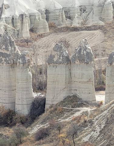 Rock formations in a barren landscape.