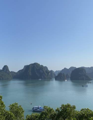 Dramatic view of limestone islands in Halong Bay.