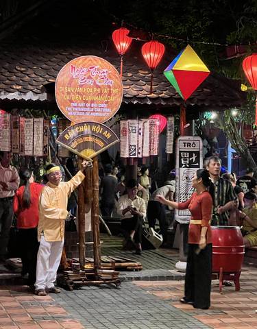 Vibrant scene at a cultural night market in Hoi An.