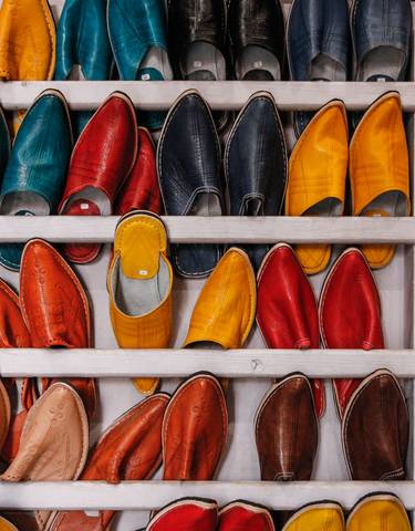 Colorful display of traditional Moroccan slippers.