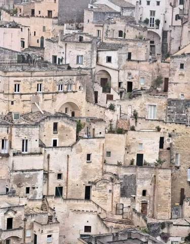 Historic city view with stone buildings.