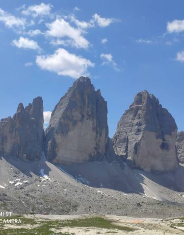 Striking rock formations under a clear blue sky.