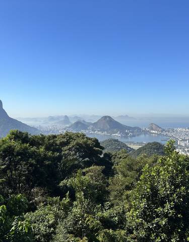 Stunning panoramic view of Rio de Janeiro encompassing iconic landmarks.