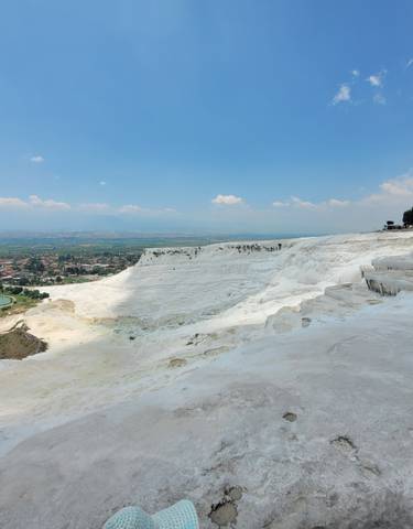 Natural terraces of Pamukkale with view of the landscape.