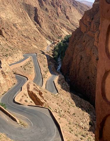 A winding mountain road with steep turns.