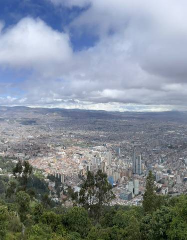 Panoramic view of a city with a mountain backdrop