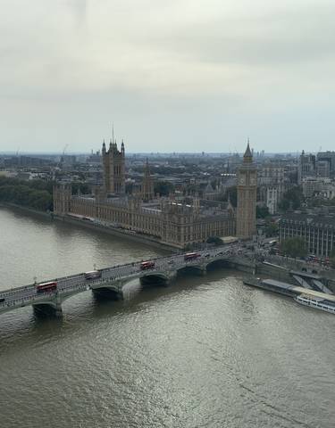 Aerial view of the River Thames with the Houses of Parliament and Elizabeth Tower in London.