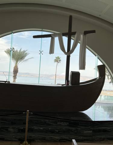 Interior view of a church through a boat-shaped altar.