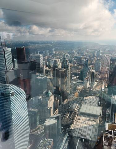 Aerial view of a bustling city with tall buildings.