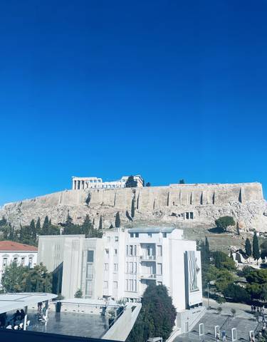 Distant view of the Acropolis on a sunny day.