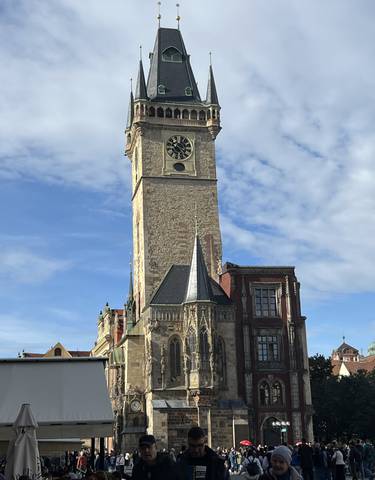 Clock tower of a historic building against the sky.