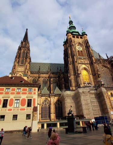 Gothic cathedral with scaffolding and intricate details.