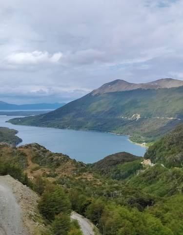 Scenic view of a lake with mountains in the background.