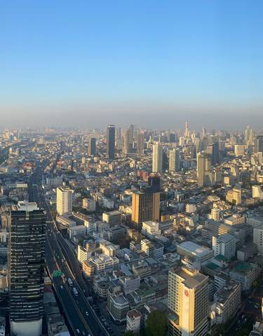 Panoramic view of a city skyline during the day.