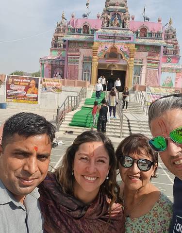 Selfie in front of a colorful temple.
