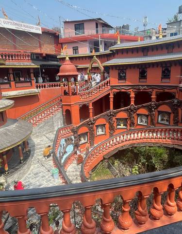 Red temple complex with ornate architecture.