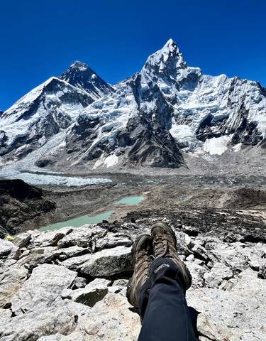 Stunning mountain landscape with icy peaks and small lakes.