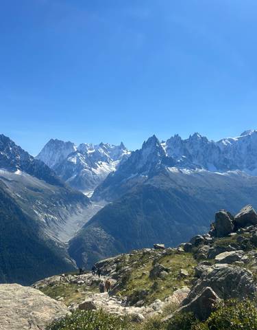 Majestic mountain peaks with a clear blue sky.