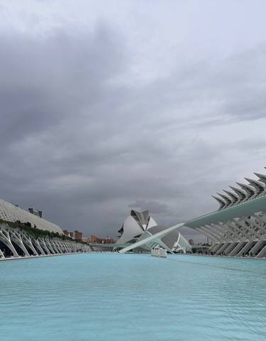 Modern architectural buildings near a water body.