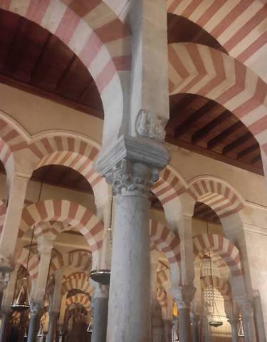 Archways with striped red and white design.