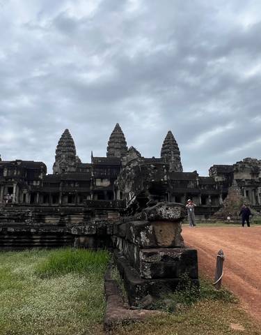 Angkor Wat temple complex with visitors.